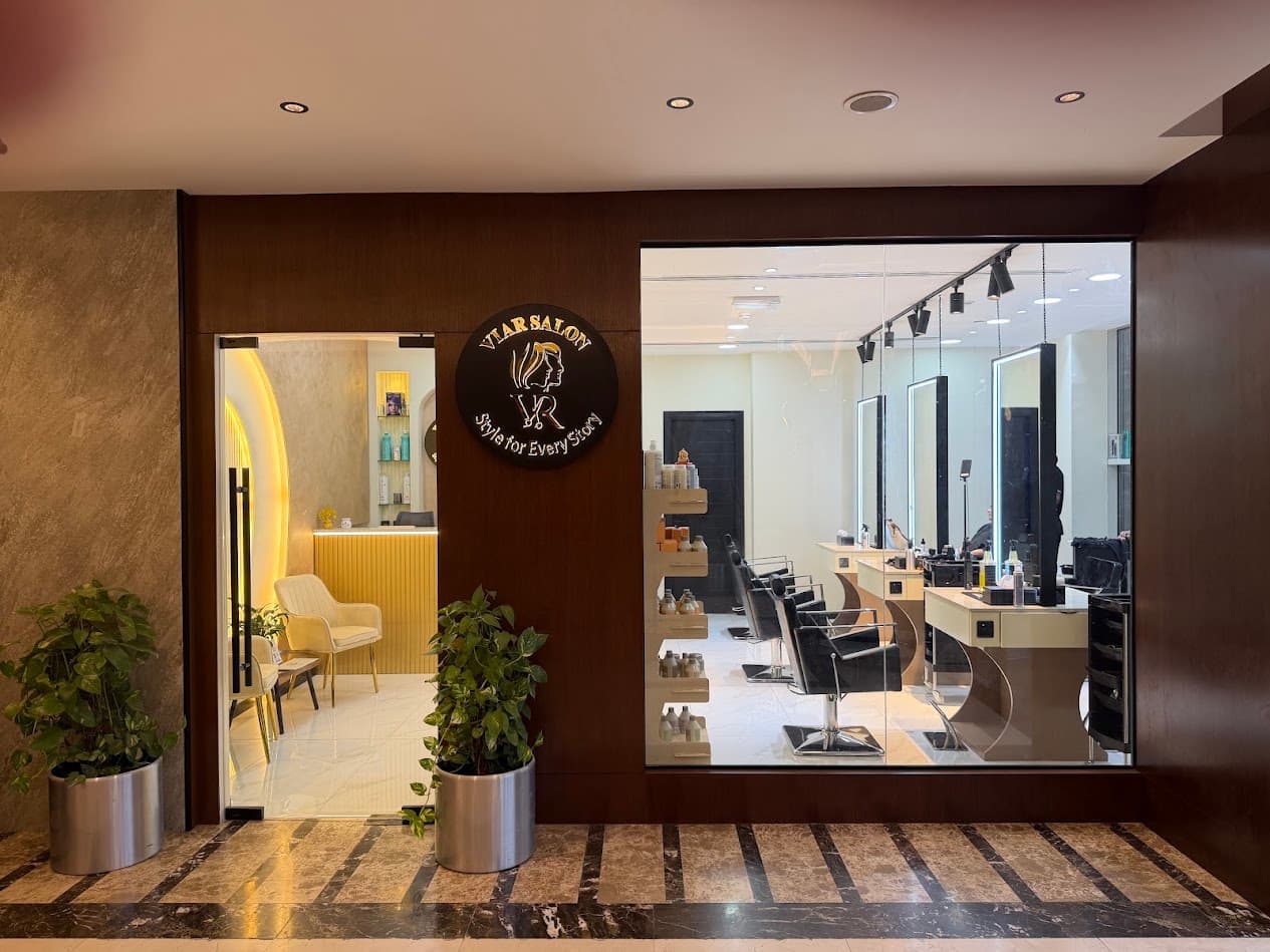 Entrance and styling area at VR Unisex Salon